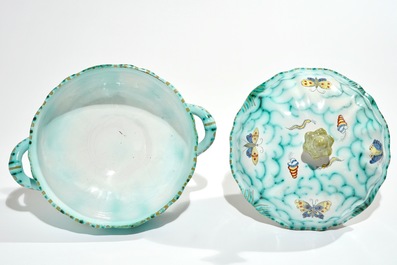 A polychrome Brussels faience tureen on stand with butterflies and caterpillars, 18/19th C.