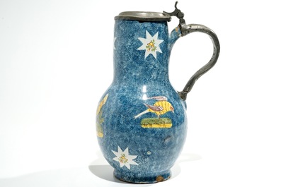 A large blue ground Brussels faience jug with a hen and a cockerel, 18/19th C.