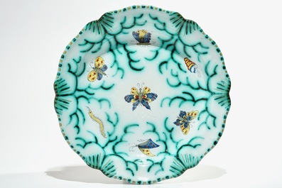 A polychrome Brussels faience tureen on stand with butterflies and caterpillars, 18/19th C.