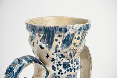 A Spanish pottery blue and white two-handled vase and cover, Triana, Seville, 18th C.