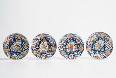 Eight Dutch Delft polychrome &quot;lightning&quot; plates, 17/18th C.