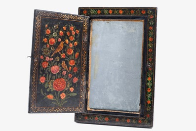 Two painted papier mache mirror frames and a painted panel, Qajar, Iran, 19th C.