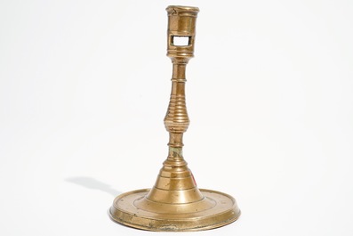 A gothic bronze candlestick, Low Countries, 16th C.