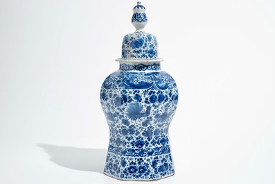 A large Dutch Delft blue and white covered vase, 18th C.