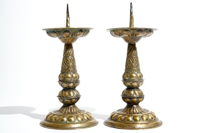 A pair of brass pricket candlesticks, 17th C.