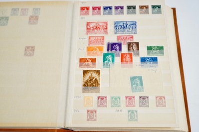 A large collection of stamps and coins, mostly Belgium and Belgian Congo