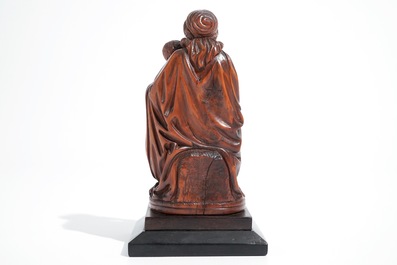 A carved boxwood Madonna with child, 17th C.