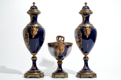 A three piece bronze-mounted Sevres porcelain garniture, 19th C.