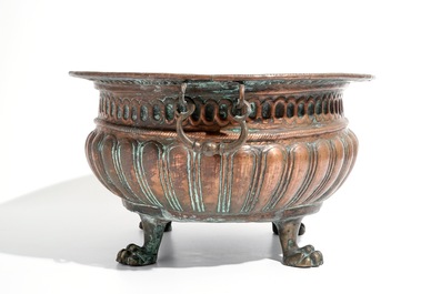 An exceptionally large brass jardiniere and two smaller ones, 17/18th C.