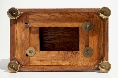 An Empire mahogany and gilt bronze portico mantle clock, France, 19th C.