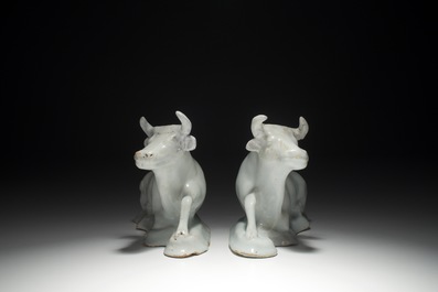 A pair of white Dutch Delft resting cows, 18th C.