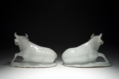 A pair of white Dutch Delft resting cows, 18th C.