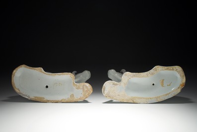 A pair of white Dutch Delft resting cows, 18th C.