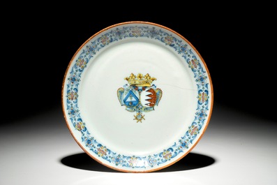 A polychrome armorial plate and a blue and white octagonal dish, Savona, Italy, 18th C.