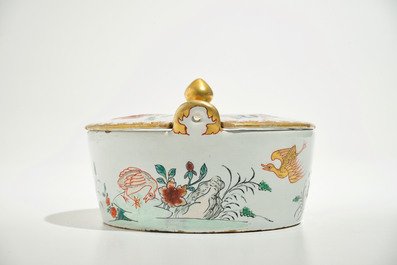 A polychrome Dutch Delft petit feu butter tub after a Chinese famille rose example, 18th C.