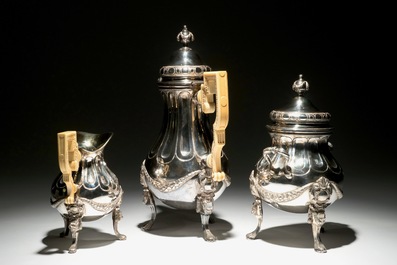 A Louis XVI silver coffeepot and milk jug with ivory handles and a sugar pot, marked for J. Roelandts, Ghent, 1779