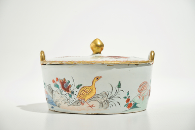 A polychrome Dutch Delft petit feu butter tub after a Chinese famille rose example, 18th C.