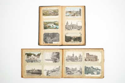 A collection of postcards in six albums and three albums of stamps, 19/20th C.