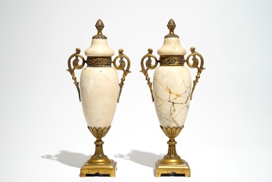 Two silver pheasants, a table bell and a pair of marble urns and covers, 19/20th C.