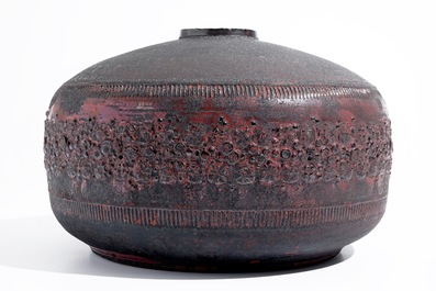 A large cylindrical modernist vase with matte black and luster glazed relief design, Perignem, 2nd half 20th C.