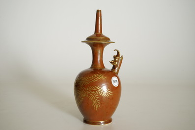 A Chinese monochrome persimmon-glazed kundika with applied gilt decoration, 18/19th C.