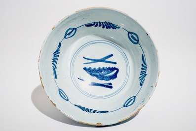A large Dutch Delft blue and white floral bowl, 18th C.
