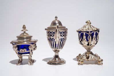 Three silver mustard jars with blue cristal interiors, 19th C.