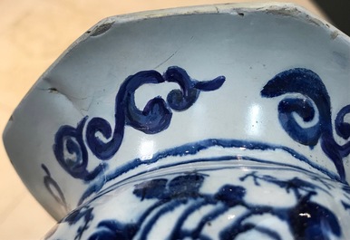 Three Dutch Delft blue and white garlic neck vases with birds on millefiori design, 18th C.