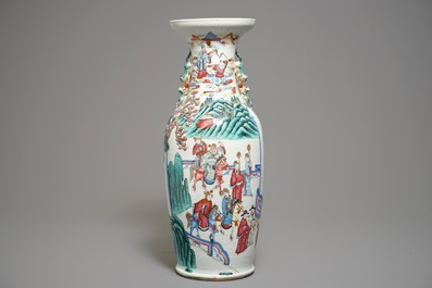 A Chinese famille rose vase with circular court scene design, 19th C.