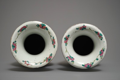 A pair of Chinese famille rose vases with figures, 19th C.