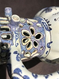 A Dutch Delft blue, white and manganese chinoiserie puzzle jug, dated 1690