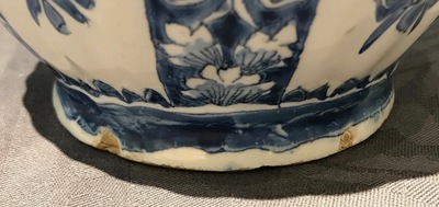 A Dutch Delft blue and white jug and cover with pewter mount, 18th C.