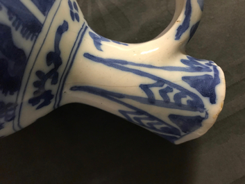 A Dutch Delft blue and white chinoiserie jug, 2nd halft 17th C.