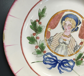 A pair of French faience portrait plates, prob. Les Islettes, 18/19th C.