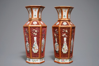 A pair of reticulated double-walled hexagonal Chinese famille rose vases, Yongzheng