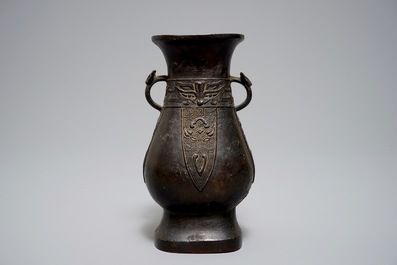 A Chinese archaistic bronze hu vase, Ming