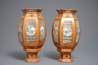 A pair of Chinese famille rose coral-ground lanterns, 19/20th C.
