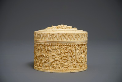 A round Chinese carved ivory dragon box and cover, 2nd half 19th C.