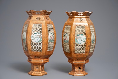 A pair of Chinese famille rose coral-ground lanterns, 19/20th C.