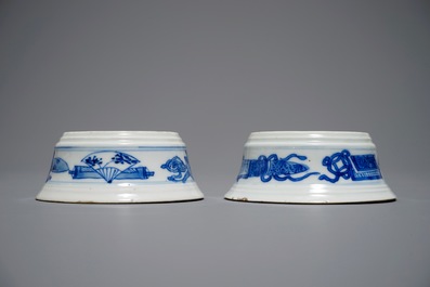 A pair of round Chinese blue and white salts with antiquities design, Kangxi