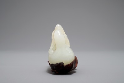 A Chinese jade group of two Mandarin ducks on lotus leaf, 19th C.