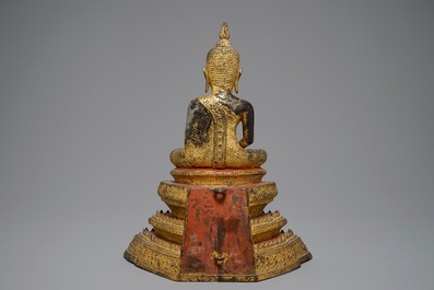 A Thai gilt bronze model of Buddha on a throne, Rattanakosin, 19th C.