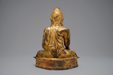 A large Burmese inlaid, gilt and lacquered bronze Mandalay-style Buddha, 19th C.