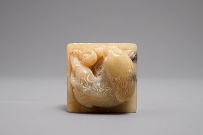 An inscribed and dated Chinese Shoushan stone seal with a Buddhist lion