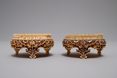 A pair of Japanese carved ivory stands, Meiji, 19th C.