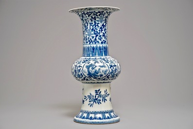A large Chinese blue and white gu dragon vase, Qianlong mark, 19th C.