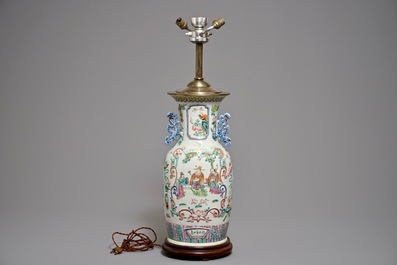 Een Chinese famille rose vaas met reli&euml;fdecor als lamp gemonteerd, 19e eeuw