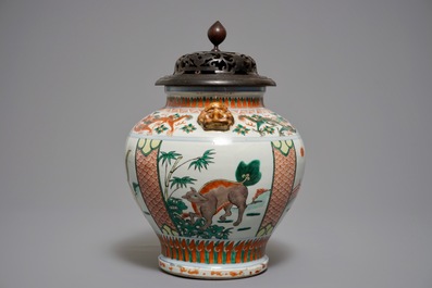 A Chinese wucai vase with mythical beasts, 19th C.