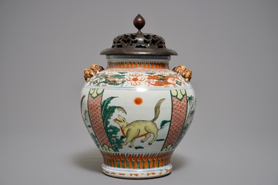 A Chinese wucai vase with mythical beasts, 19th C.