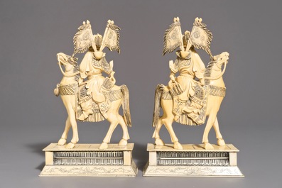 A pair of Chinese carved ivory horseriders, 19th C.